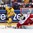 MOSCOW, RUSSIA - MAY 8: Denmark's Sebastian Dahm #32 attempts to knock the puck away from Sweden's Linus Omark #67 during preliminary round action at the 2016 IIHF Ice Hockey Championship. (Photo by Andre Ringuette/HHOF-IIHF Images)

